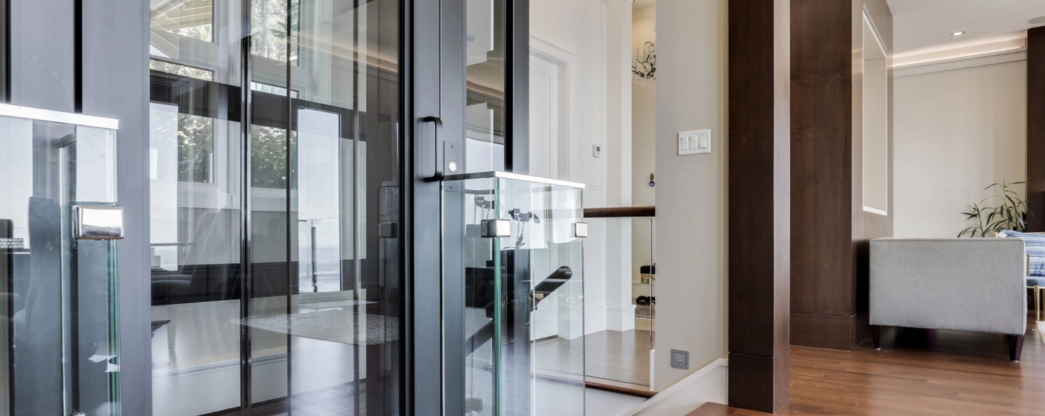 RAM glass elevator integrated into a contemporary home